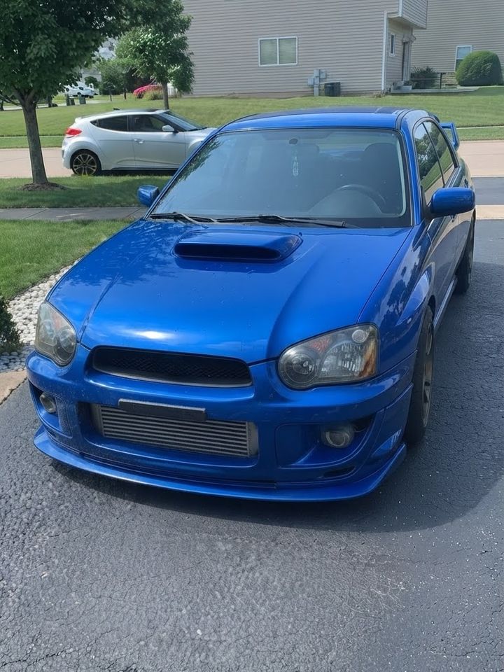 2005 Subaru Impreza WRX finished in rally blue