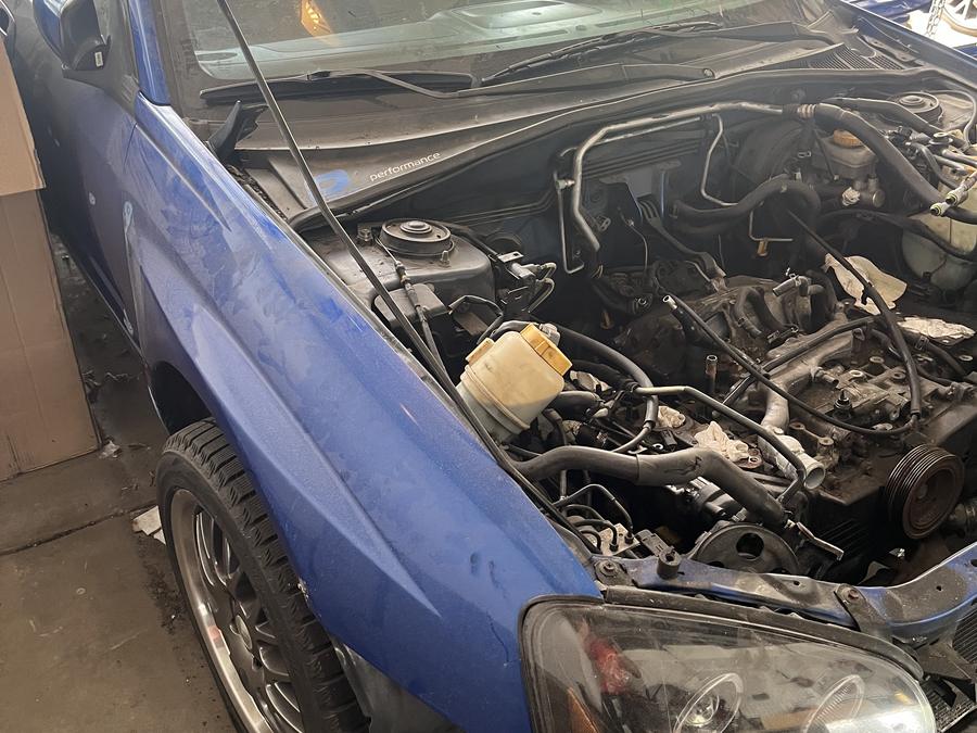 Front end apart in the garage